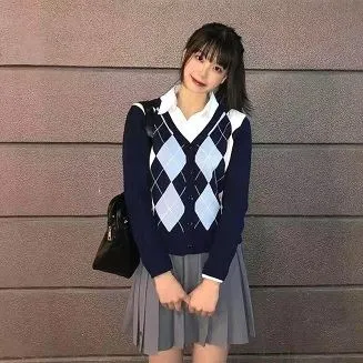 Suéter de uniforme Suéter de punto con cuello en V de diamante azul y negro